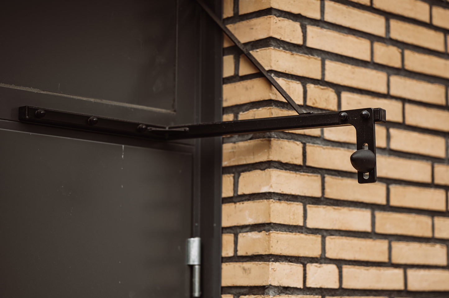 Dampening Door Stop FKR Grey – Reversible and Space-Saving Door Stop in Steel