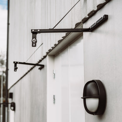 Stumt Dörrstopp FKR Grå – Vändbart och Platsbesparande Dörrstopp i Stål